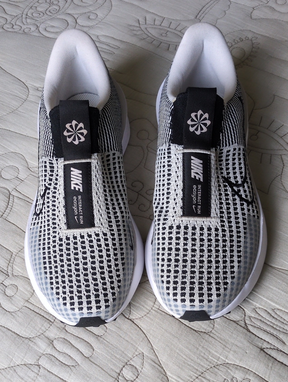 Nike Women's Black and White Interact Run EasyOn sneakers